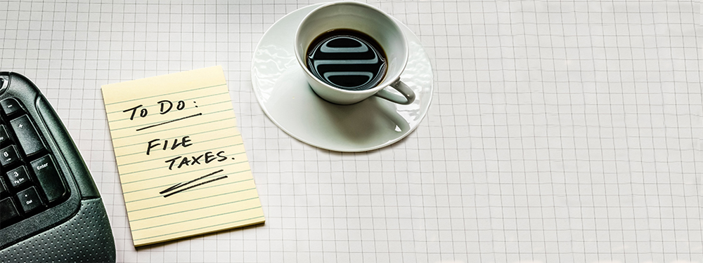Picture of a to-do-list and a cup of coffee